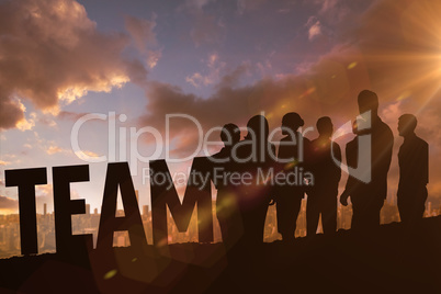 Composite image of silhouetters celebrating