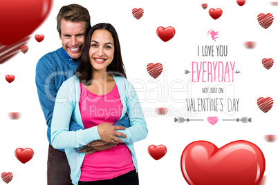 Composite image of portrait of smiling couple standing