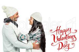 Composite image of smiling couple hugging and looking at each ot