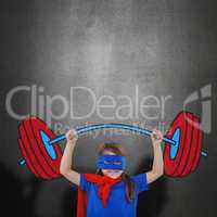 Composite image of little girl holding dumbbell