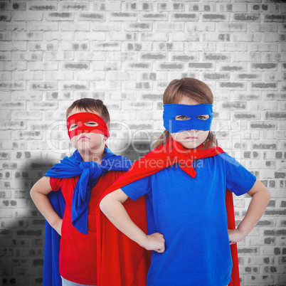 Composite image of masked kids pretending to be superheroes