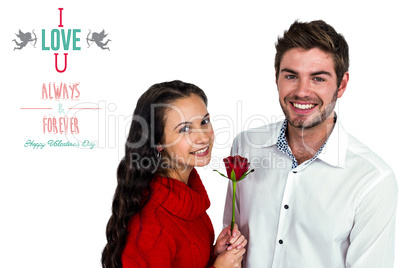 Composite image of smiling couple with rose