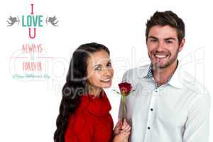 Composite image of smiling couple with rose