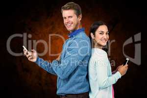 Composite image of smiling man and woman using phone