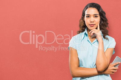 Composite image of portrait of confident businesswoman holding s