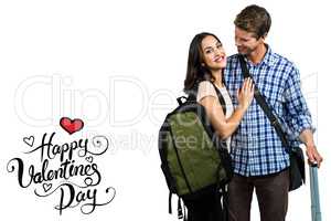 Composite image of couple with bags embracing each other