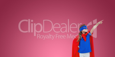 Composite image of masked girl pretending to be superhero