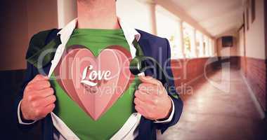 Composite image of businessman opening shirt in superhero style