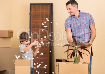 Father and his son playing indoors