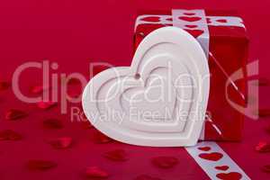 Red Holidays gift and white heart