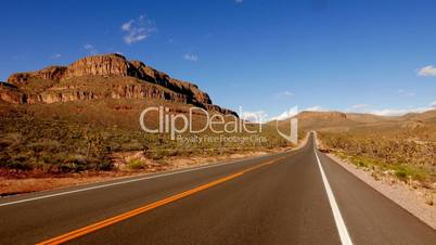 Long and empty road in south-west USA, Nevada .