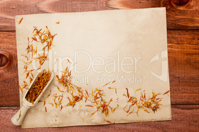 Saffron petals on an old piece of paper