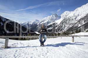Young man enjoys winter landscape