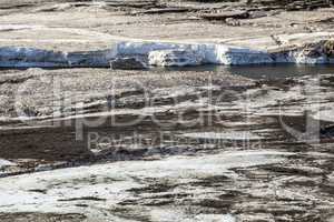 Glacial ice on a river bank, Iceland