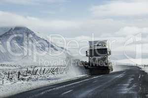 Snow removing vehicle