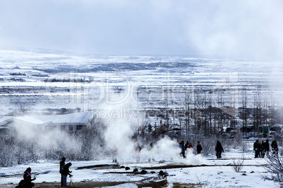 Tourists at the famous geyser Strokkur, Iceland