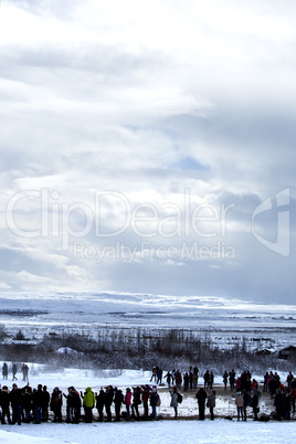 Tourists at the famous geyser Strokkur, Iceland