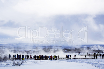 Tourists at the famous geyser Strokkur, Iceland