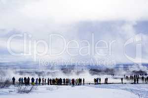Tourists at the famous geyser Strokkur, Iceland