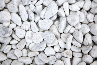 White stones at a grave as a background