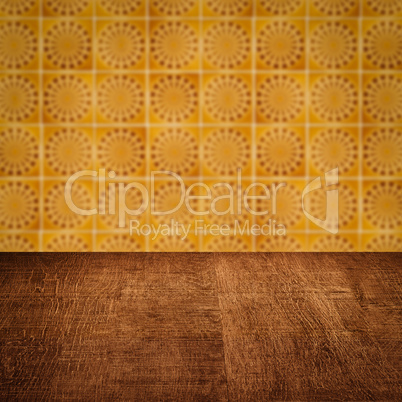 Wood table top and blur vintage ceramic tile pattern wall