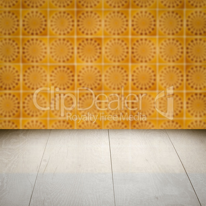 Wood table top and blur vintage ceramic tile pattern wall