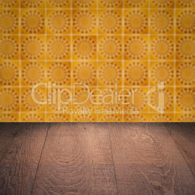 Wood table top and blur vintage ceramic tile pattern wall Wood table top and blur vintage ceramic tile pattern wall