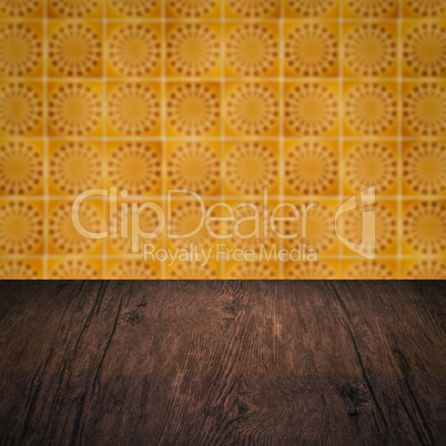 Wood table top and blur vintage ceramic tile pattern wall Wood table top and blur vintage ceramic tile pattern wall