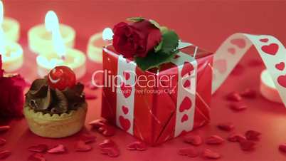 Chocolate cupcake with roses and gift