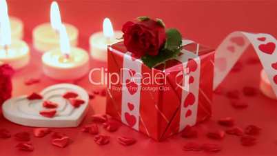 Red roses and heart shape on red background