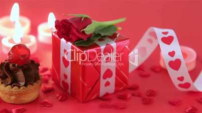 Chocolate cupcake with roses and gift