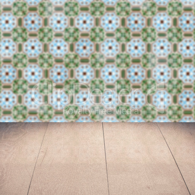 Wood table top and blur vintage ceramic tile pattern wall