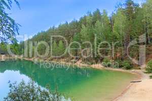 beautiful lake with azure water in the forest