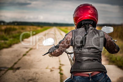 Biker girl on a motorcycle