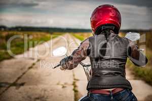 Biker girl on a motorcycle