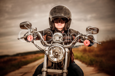 Biker girl on a motorcycle