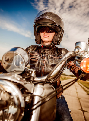 Biker girl on a motorcycle