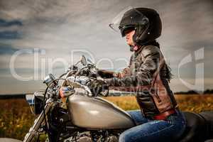 Biker girl on a motorcycle