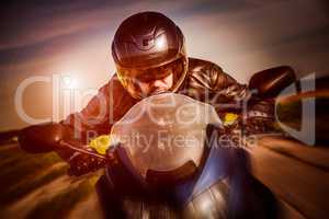 Biker racing on the road