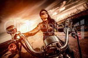 Biker girl on a motorcycle