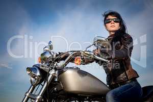 Biker girl on a motorcycle