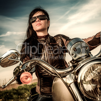 Biker girl on a motorcycle