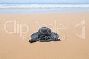 sun hat on the sandy beach