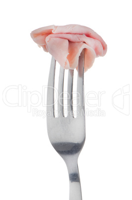 Slice of ham skewered on a fork