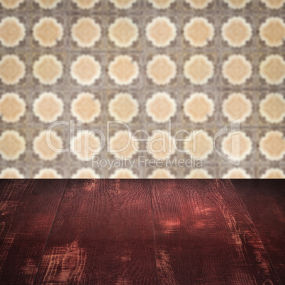 Wood table top and blur vintage ceramic tile pattern wall Wood table top and blur vintage ceramic tile pattern wall