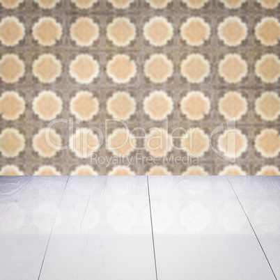 Wood table top and blur vintage ceramic tile pattern wall