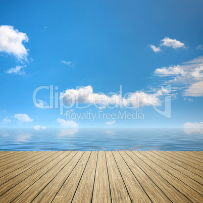 wooden jetty blue sky