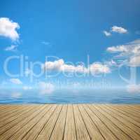 wooden jetty blue sky