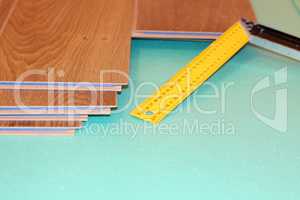 ruler and laminate on substrate