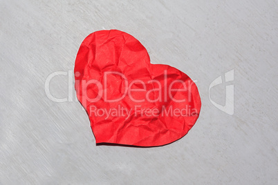 Crumpled red paper heart